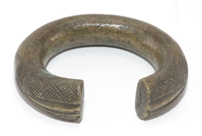 Vier manilla bronzen armbanden - West Afrika
