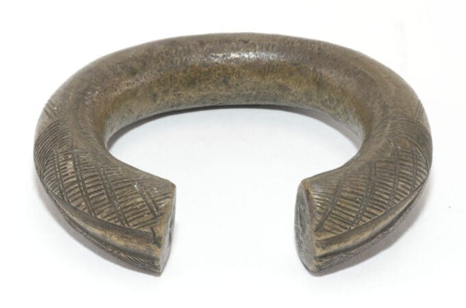 Vier manilla bronzen armbanden - West Afrika