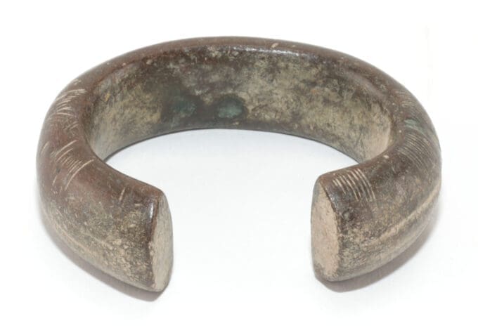 Vier manilla bronzen armbanden - West Afrika