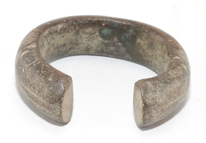 Vier manilla bronzen armbanden - West Afrika